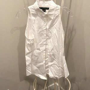 White sleeveless blouse